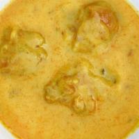 Punjabi Kardhi Entree · Onion dumplings in a yogurt and buttermilk based curry. All Entrees come in a 16 oz portion,...