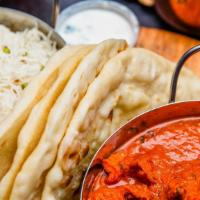 Chicken Tikka Masala Indian Family Feast (Serves 4) · Bhojanic favorites for your family dinner. Rice Pullao (32 oz), Chicken Tikka Masala (32 oz)...