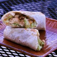 Buffalo Chicken Wrap · Fried or grilled chicken rolled in buffalo sauce.  Wrapped in a 10 inch flour tortilla  with...
