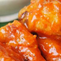 Sabor Crispy Wings  · 6 prt Order CrispyJumbo  oven  baked/ pan fried Wings - Tossed in one of our house sauces - ...
