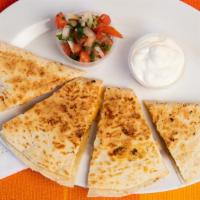 Quesadillas · Flour tortilla with Monterey and jack cheese choice of steak, pastor or chorizo.
Tortilla de...
