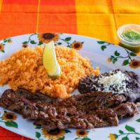 Carne Asada · Gilled Steak  side of rice, beans and corn tortilla.
Carne Asada acompanada de arroz, frijol...