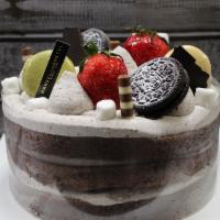Choco Macaroon · A Chocolate Sponge Cake Layered with Whipped Cookies and Cream Frosting. Finally, Topped wit...