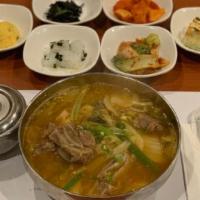 Woo Guh Ji Galbi Tang · Short rib and Korean cabbage cooked in spicy soup.