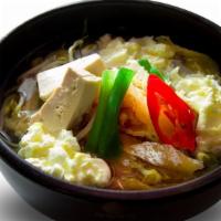 Dda Ro Guk Bap · Beef broth based soup, rice and soup separated