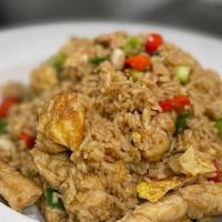 Arroz Chaufa · Peruvian fried rice with choice of protein. Seasoned with sesame oil, ginger, spring onion, ...