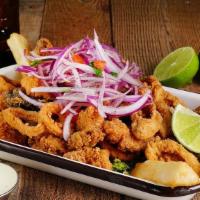 Jalea Mixta · Fried seafood. Served with fried yuca and salsa criolla.