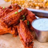 Classic Chicken Wings 10Pc · Gluten free. Choice of house-made sauce.