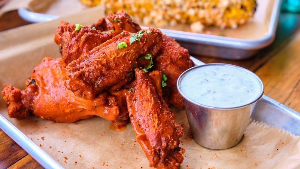 Classic Chicken Wings 10Pc · Gluten free. Choice of house-made sauce.