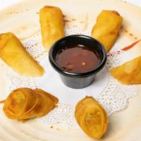 Spring Rolls · Deep fried vegetable spring rolls served with sweet chili sauce.