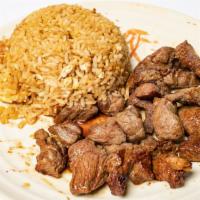Filet Hibachi · Steak grilled with garlic butter and served with rice (fried rice has eggs only),  yum yum a...