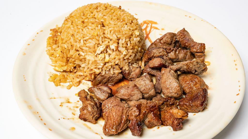 Filet Hibachi · Steak grilled with garlic butter and served with rice (fried rice has eggs only),  yum yum and teriyaki sauce.  Vegetables not included.