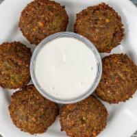 Falafel Balls (8Pc) · Fried chickpea balls served with tahina.