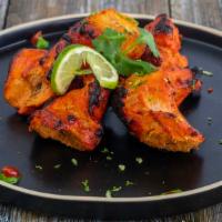 Chicken Tikka Kebab · Boneless, yogurt and spice marinated chargrilled.