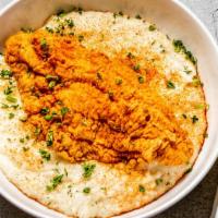 Catfish & Grits · Golden fried catfish with creamy grits, 2 scrambled eggs.