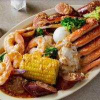 Snow Crab/Shrimp · SERVED WITH 1 CLUSTER SNOW CRAB AND 8 JUMBO SHRIMPS. (with sides +$3.99)