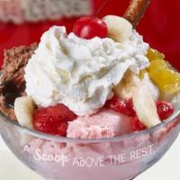 Banana Split · A true classic 1 scoop each of vanilla, chocolate and strawberry ice cream plus a sliced ban...
