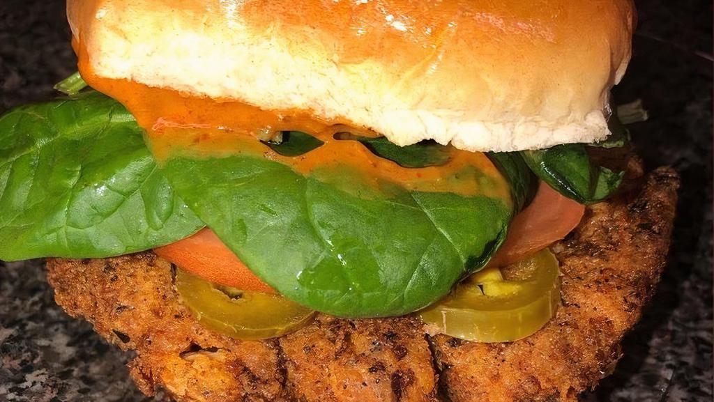 Chipotle Jack · A spicy Jackfruit patty topped with a well-flavored vegan chipotle mayo, jalapeños, spinach and tomato.