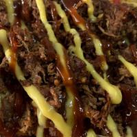 Loaded Fries · Seasoned fries topped with pulled jackfruit, bbq sauce, and cheeze sauce
