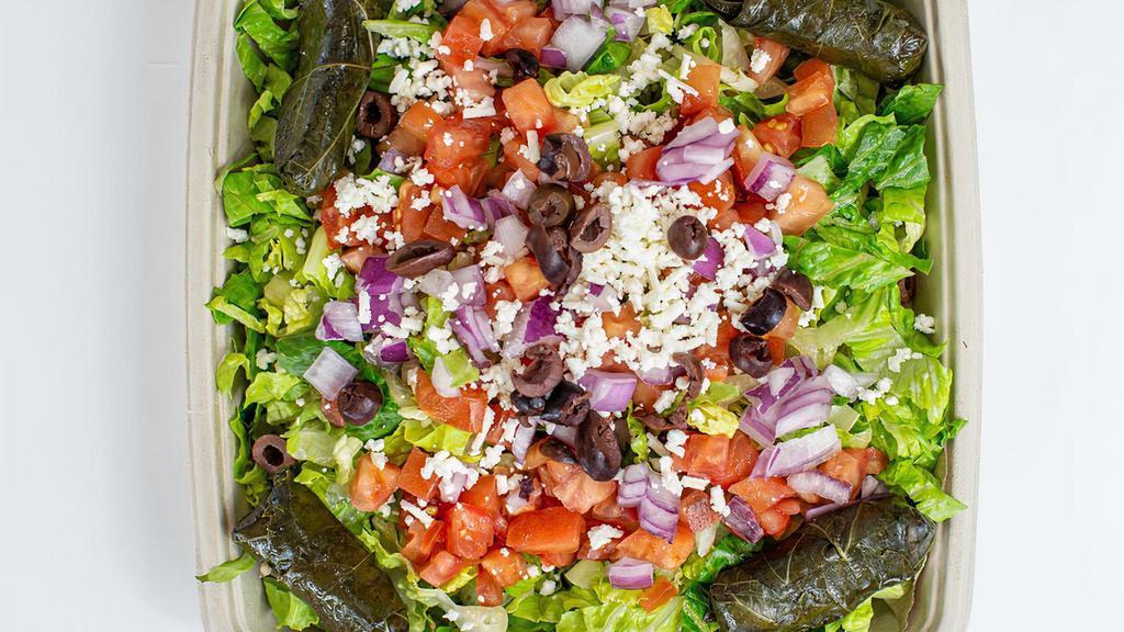 Large Greek Salad Family Meal · Greek Salad includes Romaine Lettuce, Tomato, Cucumber, Red Onion, Feta Cheese, Kalamata Olives and Greek Dressing.