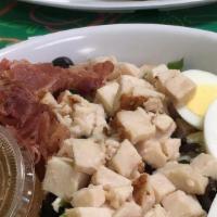 Cobb Salad · Chicken, bacon, feta cheese, romaine lettuce, egg, black olives, ranch dressing.