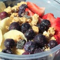 Nutella Acai Bowl · acai blend-topped with gronalla,banana strawberries,nutella,peanut butter,cacao nibs