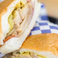 Cuban Sandwich · Pork, ham, pickles, swiss cheese, and mustard.