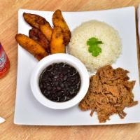 Pabellon · Shredded meat, black beans, plantain, and rice.