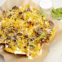 Nachos · Most Popular. Served with beans, cheese, pico de gallo, sour cream, and guacamole. Add extra...