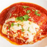 Lasagna · Tender lasagna noodles layered with ground beetroots and mozzarella and topped with our fres...