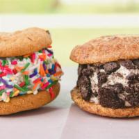 Cookie Ice Cream Sandwich · Choose 2 flavored cookies, Choose 1 ice cream flavor and toppings are extra $0.60.