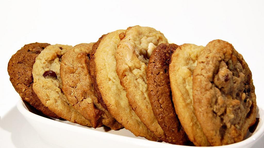 Half Dozen - 6 Cookies · Choose 6 cookie flavors. Freshly baked daily!