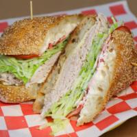 The Wally (Large) · golden roasted turkey, muenster cheese, lettuce, tomato, cucumber, mayo, spicy mustard, salt...