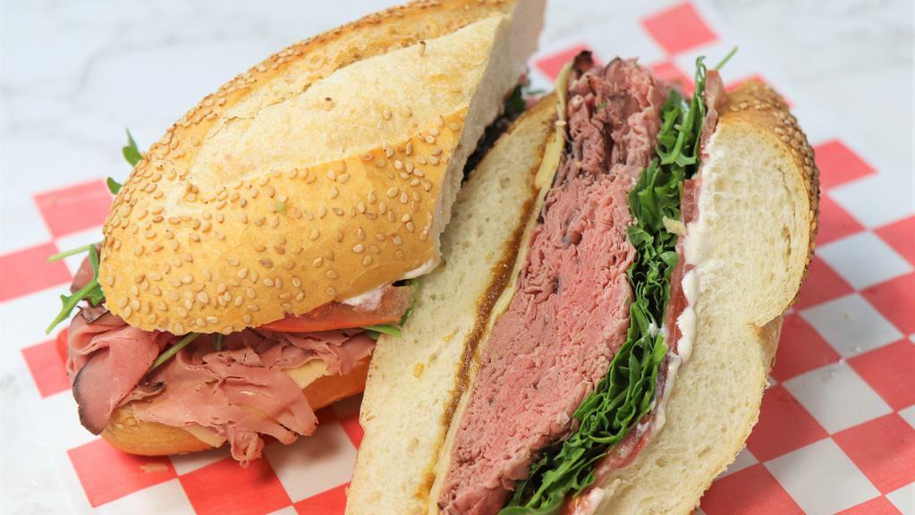The Roast B (Small) · roast beef, Swiss cheese, caramelized onions, arugula, tomatoes, salt, pepper, extra virgin olive oil, and red wine vinegar.