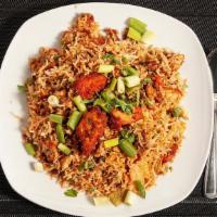 Fried Rice (Chicken) · Pan tossed rice with chicken and special spices. Food Allergy Warning: Food Prepared at this...