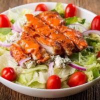 Buffalo Chicken Salad · Romaine and iceberg lettuce, spinach leaves, crispy chicken breast tossed in buffalo sauce, ...