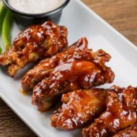 12 Piece Wings · 12 Piece wings tossed in your choice of sauces includes ranch or blue cheese and celery.