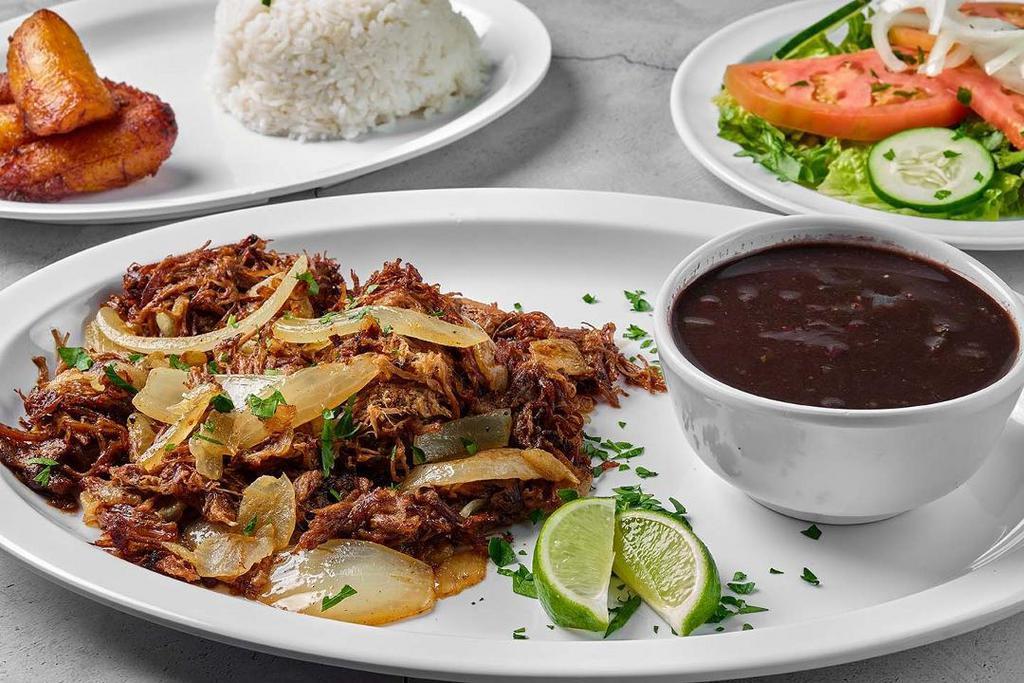 Vaca Frita De Res · Shredded beef grilled with onions and Cuban mojo.