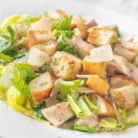 Small Caesar Salad · Romaine lettuce, roasted garlic croutons, shredded parmesan cheese