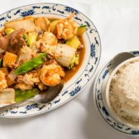Triple Delight · Shrimp, chicken, beef, stir-fried with mixed vegetable in brown sauce.