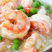 Shrimp With Lobster Sauce虾龙糊 · Shrimp with peas ,carrots,and eggs in a creamy whitel sauce.