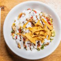 Southwestern Bowl · grilled chicken or steak with pico de gallo, chihuahua cheese, & charred corn topped with so...