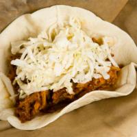 Pulled Pork Taco · slow roasted pork with house-made bbq sauce & coleslaw