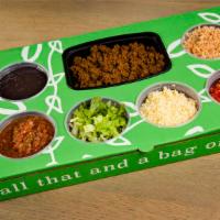 Taco Box · Feeds 4-5. Includes sides of Rice and Beans, Salsa, Tortillas, Lettuce, Tomato, Cheese, Sour...