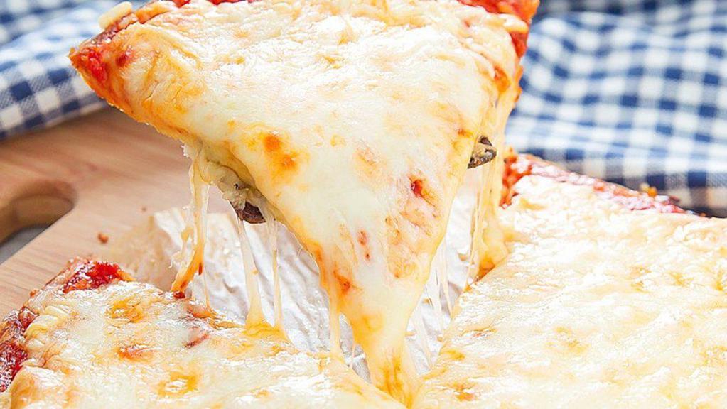 White Pizza · Ricotta and parmesan base with mozzarella, garlic and fresh tomatoes.
