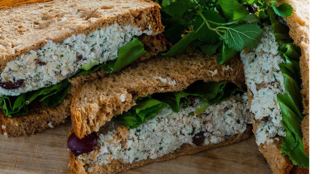 Chicken Salad Sandwich · Our famous chicken salad made with pecans, grapes, celery, and tarragon with fresh lettuce on whole wheat bread.