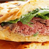 Roast Beef Sandwich · Homemade thinly sliced roast beef with fresh arugula and horseradish dijonnaise, on a soft c...