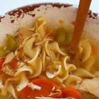 Chicken Noodle Soup · Homemade chicken stock, like mom used to make, with a generous helping of chicken, carrots, ...