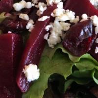 Beet And Blue Salad · Mixed greens, dried cranberries, julienne beets, crumbled blue cheese and raspberry vinaigre...
