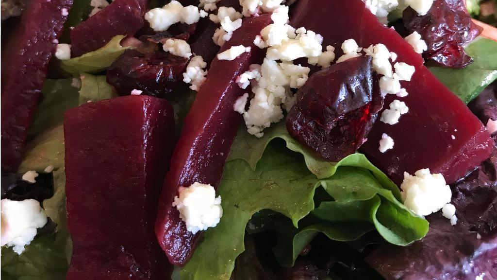 Beet And Blue Salad · Mixed greens, dried cranberries, julienne beets, crumbled blue cheese and raspberry vinaigrette.